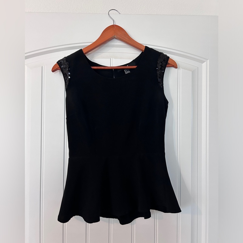 Black sequined peplum top
